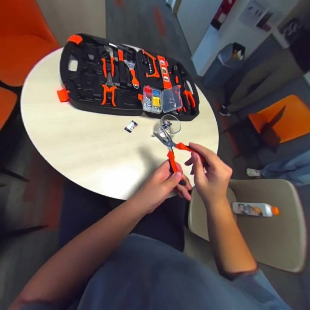 First-person repair scene using pliers